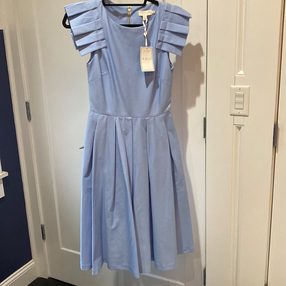 Ted Baker dress in size 2. New with tags. Added lace included for sleeves